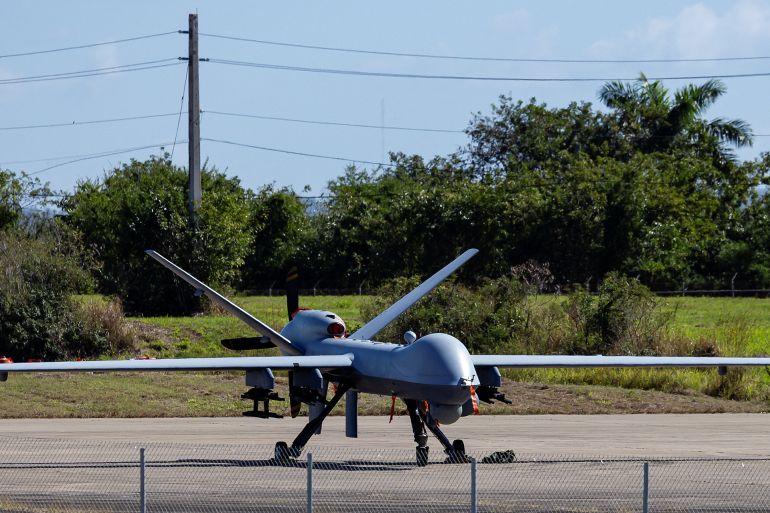 A U.S. Air Force MQ-9 Reaper aircraft is parked on the tarmac at Rafael Hernandez Airport, amid tensions between U.S. President Donald Trump's administration and the government of Venezuelan President Nicolas Maduro, in Aguadilla, Puerto Rico, December 27, 2025. REUTERS/Eva Marie Uzcategui
