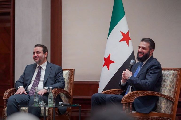 5rytfg-1774865128 الرئيس الشرع خلال لقائه أبناء الجالية في ألمانيا @وكالة سانا