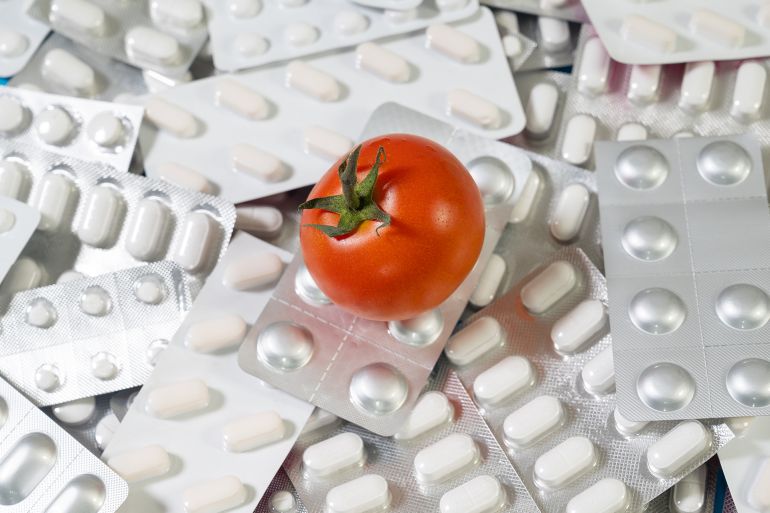 Tomato health properties vs. pills, vitamins