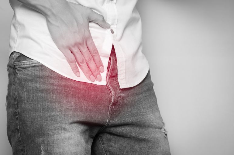 Male hands holding on middle crotch of trousers with prostate inflammation, Prostate cancer, Men's health care concept. by Touchr @ادوبي ستوك