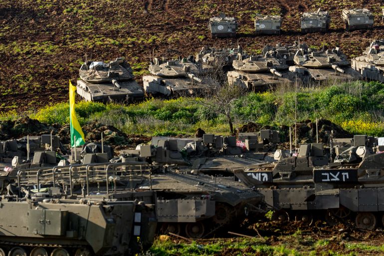 NORTHERN ISRAEL - MARCH 7: Israeli tanks are parked near a wall near the border with Lebanon on March 7, 2026 in northern Israel. Israel has continued its aerial and ground assault in Lebanon after Hezbollah, the Iran-backed militant group in Lebanon, launched missiles at Israel in what it said was retaliation for the joint U.S.-Israeli war on Iran. (Photo by Erik Marmor/Getty Images)