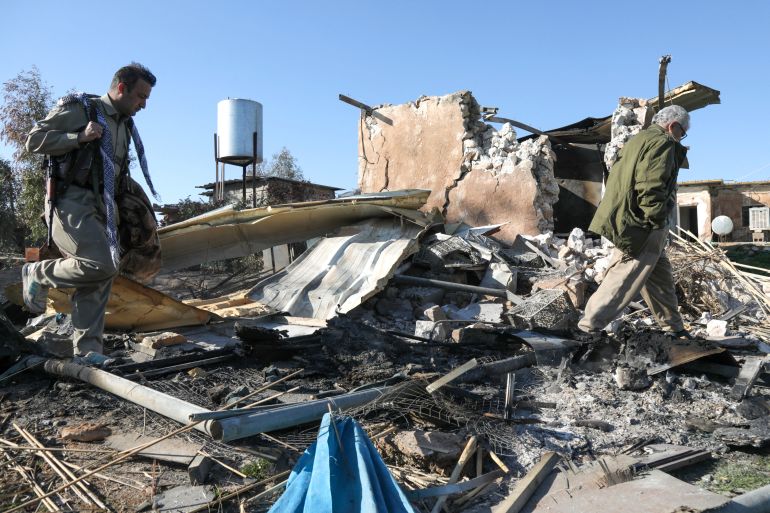afp_69a732662262-1772565094 An Iranian Kurdish Peshmerga member of the Kurdistan Democratic Party of Iran (KDPI) inspects damage sustained at the Azadi Camp of the Kurdistan Democratic Party of Iran (KDPI) following an Iranian cross-border attack in the town of Koye (Koysinjaq), in the east of Erbil district in the autonomous Kurdish region of northern Iraq on March 3, 2026.