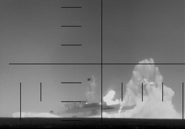 TOPSHOT - This frame grab from a video released by the US Department of Defense on March 4, 2026, shows what the Department of Defense says is periscope footage of a US Navy submarine firing on and sinking an Iranian warship in the Indian Ocean.