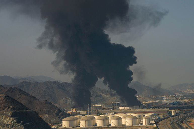 ap26073430490625-1774228408 Fire and plumes of smoke rise from an oil facility in Fujairah, United Arab Emirates, Saturday, March 14, 2026. (AP Photo/Altaf Qadri)