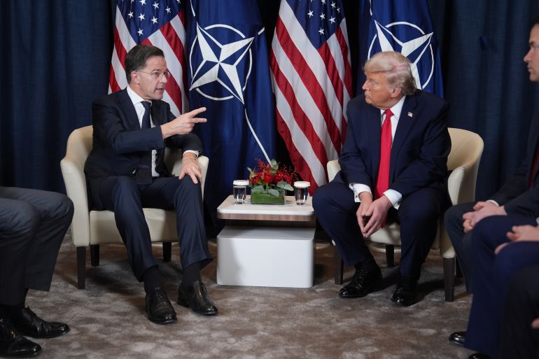ap_6971847a1bb35-1769047162 President Donald Trump, right, meets with NATO Secretary General Mark Rutte during a meeting on the sidelines of the Annual Meeting of the World Economic Forum in Davos, Switzerland, Wednesday, Jan. 21, 2026. (AP Photo/Evan Vucci)