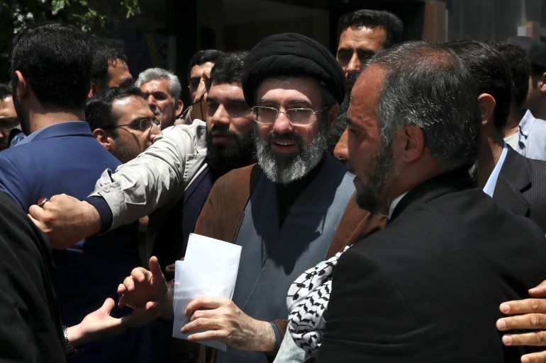 FILE - Mojtaba, son of Iranian Supreme Leader Ayatollah Ali Khamenei, center, attends the annual Quds, or Jerusalem Day rally in Tehran, Iran, on May 31, 2019. Ebrahim Raisi was seen as a prime candidate to succeed the 85-year-old supreme leader. His death on Sunday, May 19, 2024 in a helicopter crash makes it more likely that the job could eventually go to Khamenei's son. (AP Photo/Vahid Salemi, File)
