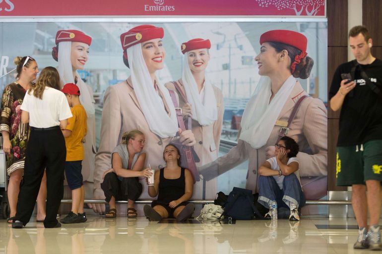 FILE - Stranded travelers wait as flights to the Middle East are cancelled following the attack on Iran by the U.S. and Israel, at Ngurah Rai International Airport in Kuta, Bali, Indonesia on Sunday, March 1, 2026. (AP Photo/Firdia Lisnawati, File)