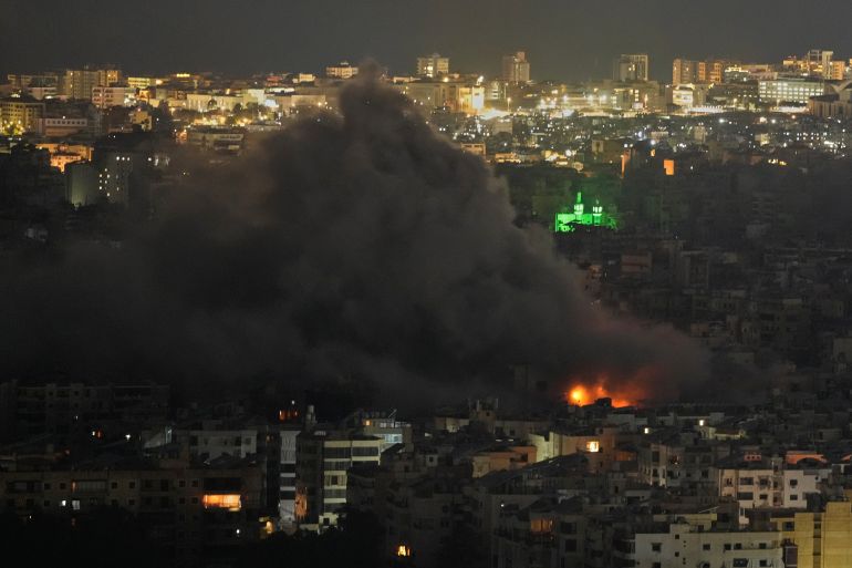 Flames and smoke rise following an Israeli airstrike, in Dahiyeh, Beirut's southern suburbs, Monday, March 9, 2026. (AP Photo/Hassan Ammar)