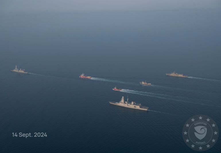 This photo released by the European Union’s Operation Aspides shows warships attached to the mission escorting salvage ships in the Red Sea on Saturday, Sept. 14, 2024. A new attempt has begun to try to salvage an oil tanker burning in the Red Sea after attacks by Yemen’s Houthi rebels, a European Union naval mission said Saturday. (European Union's Operation Aspides via AP)