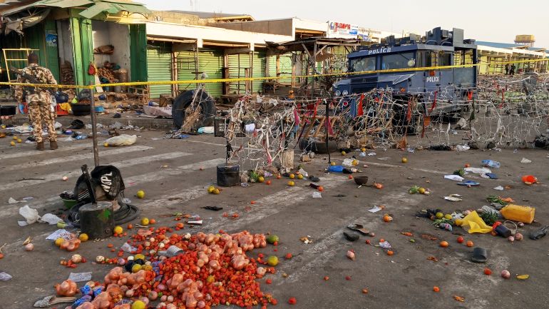 The damage of the market place is seen after the scene of a bomb blast in Maiduguri, Nigeria, Tuesday, March 17, 2026. (AP Photo/Jossy Ola )