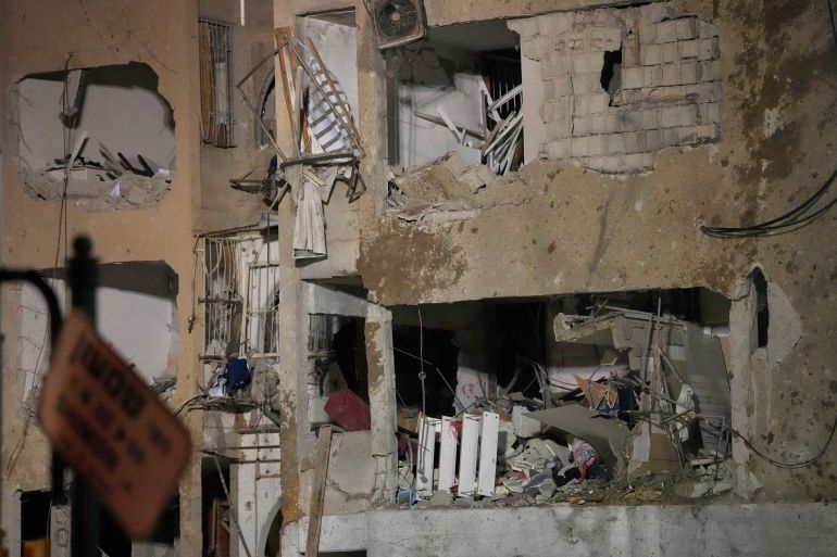 ap_69bf458f03520-1774142863-1 The damaged facade of an apartment building is seen at the site struck by an Iranian missile in Arad, southern Israel, Sunday, March 22, 2026. (AP Photo/Ohad Zwigenberg)
