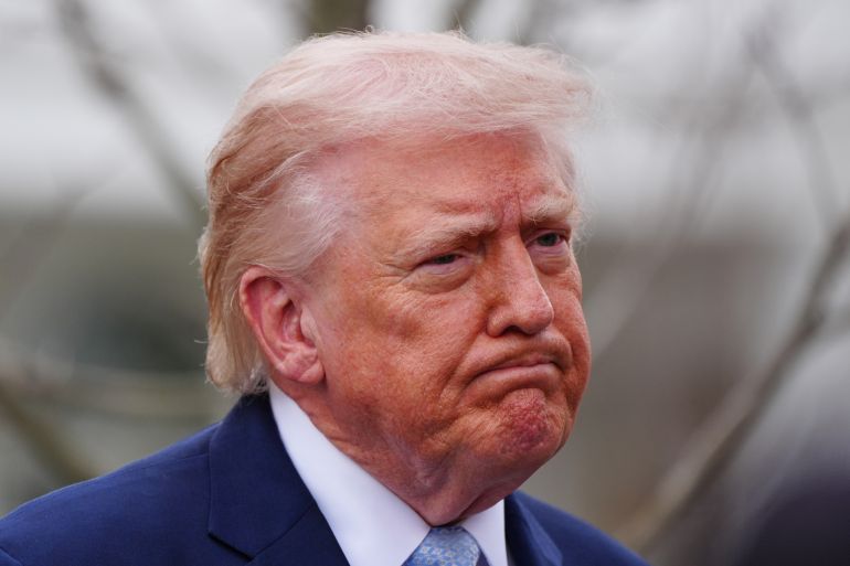 President Donald Trump speaks with reporters before departing on Marine One from the South Lawn of the White House, Friday, March 20, 2026, in Washington. (AP Photo/Alex Brandon)