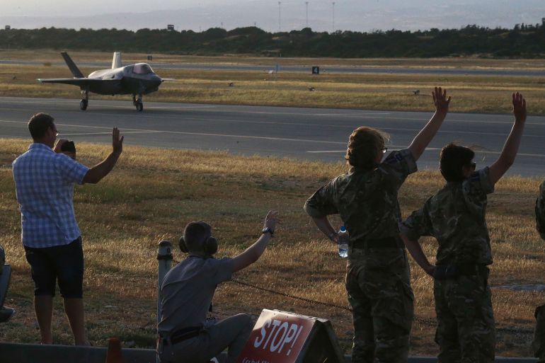 ap_69c322e59b47c-1774396133 FILE - British soldiers wave to the F-35B aircraft after landing at Akrotiri Royal air forces base near city of Limassol, Cyprus, May 21, 2019. (AP Photo/Petros Karadjias, File)