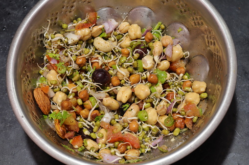 d8a8d982d988d984d98ad8a7d8aa-1774101509 Fresh and healthy sprouts isolated on black background