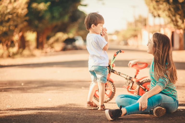 d8b3d98ad8b4d8b0d8b3d8b0d8b4d8b0d9a5d9a6d9a4d9a51-1773493697 Mother and Son Playing with a Tricycle on the Street