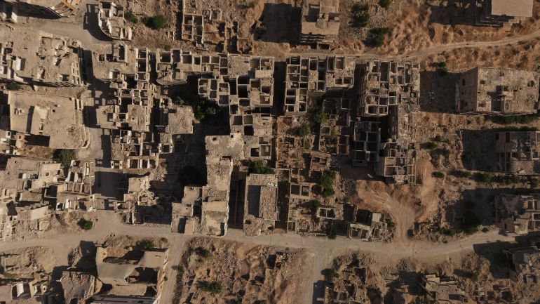 DAMASCUS, SYRIA - AUGUST 13: An aerial view shows the residential area after twelve years on from the Eastern Ghouta chemical massacre, in which the ousted Assad regime killed more than 1,400 civilians with toxic gas, survivors continue to live with the fear and anguish of that day, in Damascus, Syria on August 13, 2025. The August 21, 2013 attack, one of the deadliest of its kind, left thousands dead, most of them women and children. (Photo by Bakr Al Kasem/Anadolu via Getty Images)