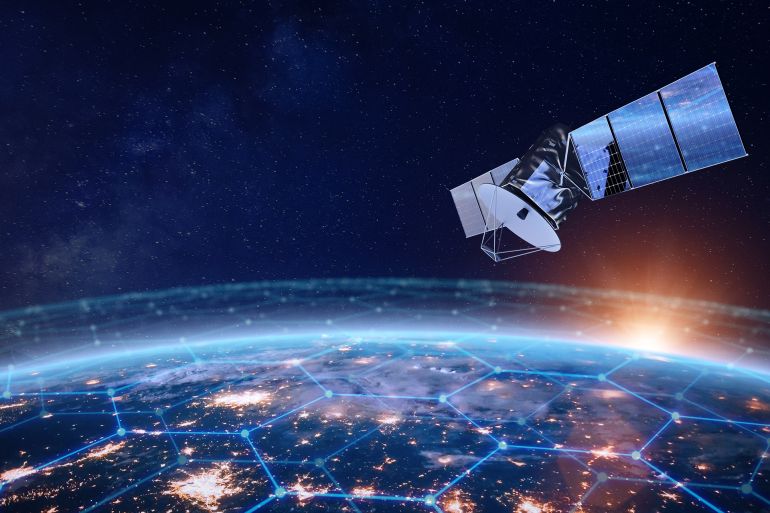 ftt7ftg-1769344249 Telecommunication satellite providing global internet network and high speed data communication above Europe. Satellite in space, low Earth orbit. Worldwide data communication technology. Some elements from NASA (https://visibleearth.nasa.gov/images/144897/earth-at-night-black-marble-2016-grayscale-maps/144926l)