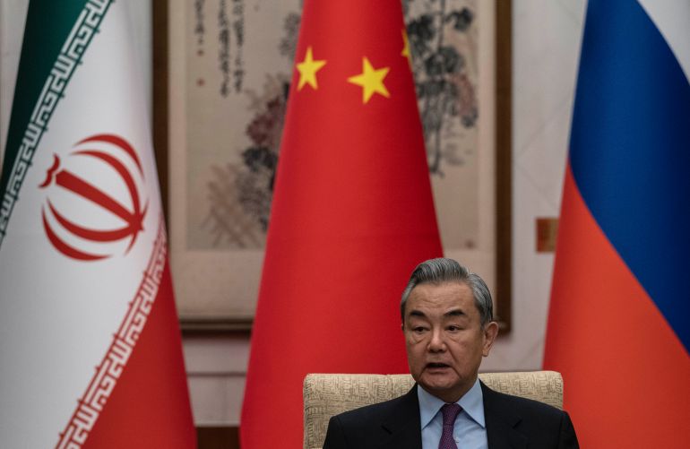 getty_69c0fa60cd-1774254688 BEIJING, CHINA - MARCH 14: Chinese Foreign Minister Wag Yi during a meeting with Russian Deputy Foreign Minister Sergey Ryabkov and Iranian Deputy Foreign Minister Kazeem Gharibabadi, regarding the Iranian nuclear issue at Diaoyutai State Guest House on March 14, 2025 in Beijing, China. (Photo by Getty Images)