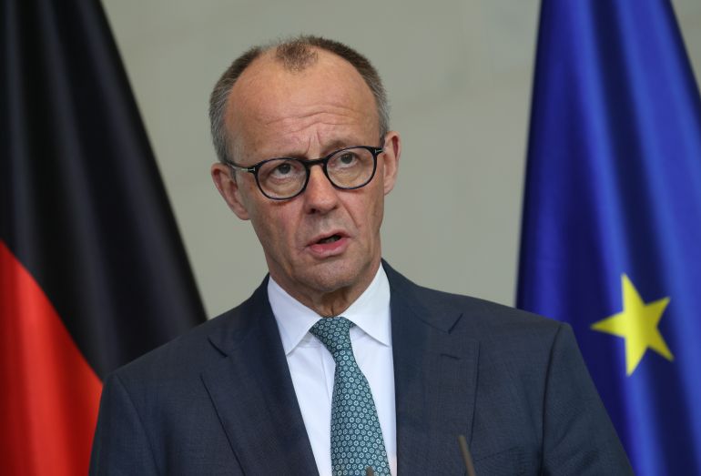 getty_69caa1d0d6-1774887376 BERLIN, GERMANY - MARCH 30: German Chancellor Friedrich Merz and Syrian President Ahmed al-Sharaa (not pictured) speak to the media following talks at the Chancellery on March 30, 2026 in Berlin, Germany. Al-Sharaa is on his first visit to Berlin since taking office. He is meeting with German leaders and taking part in an economic round table. (Photo by Sean Gallup/Getty Images)