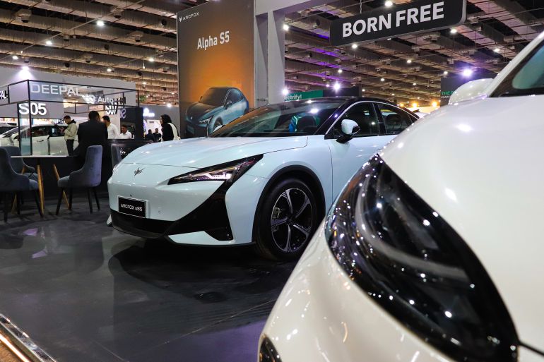 Modern electric vehicles are on display at the second edition of the Cairo Electric Vehicle Exhibition in Cairo, Egypt, on December 18, 2025. (Photo by Ahmed Mosaad/NurPhoto via Getty Images)
