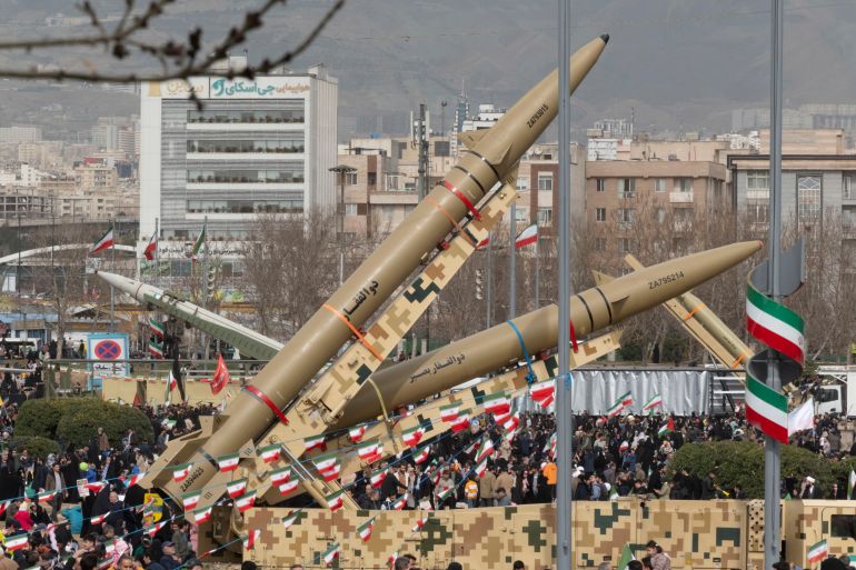 Two Iran-made ballistic missiles, Zolfaghar (top) and Zolfaghar Basir, are displayed during a rally commemorating the 47th anniversary of the Islamic Revolution's victory in Azadi (Freedom) Square in western Tehran, Iran, on February 11, 2026. (Photo by Morteza Nikoubazl/NurPhoto via Getty Images)