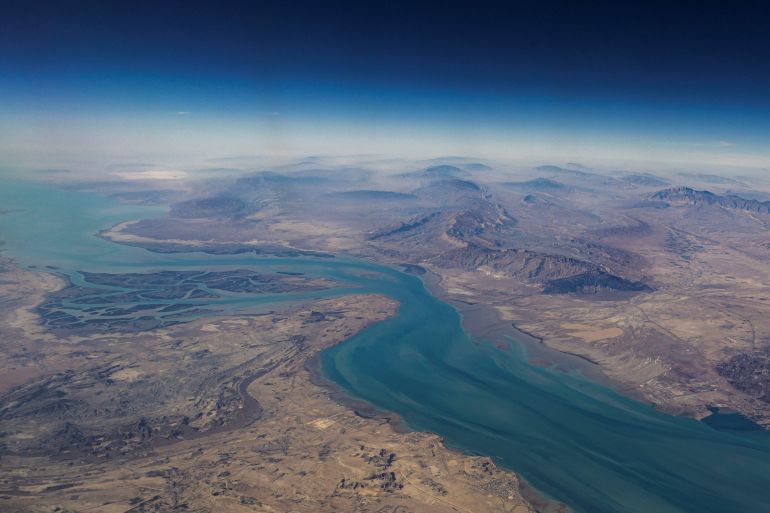 FILE PHOTO: An aerial view of the Iranian shores and the island of Qeshm in the strait of Hormuz, December 10, 2023. REUTERS/Stringer/File Photo
