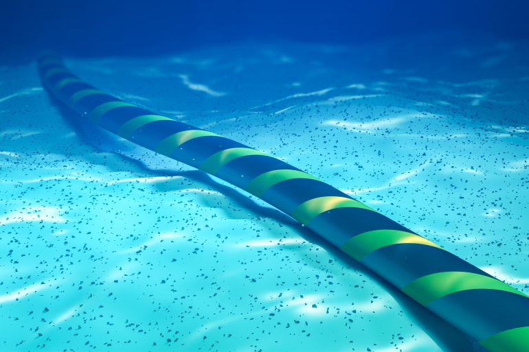 Underwater internet communication cable on the seabed. 3d rendering