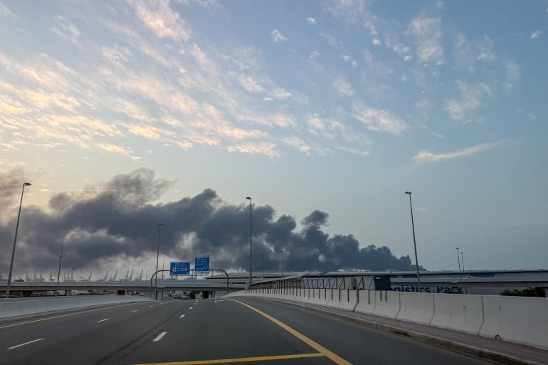 Smoke billows from Jebel Ali port after an Iranian attack, following United States and Israel strikes on Iran, in Dubai, United Arab Emirates, March 1, 2026. REUTERS/Abdelhadi Ramahi