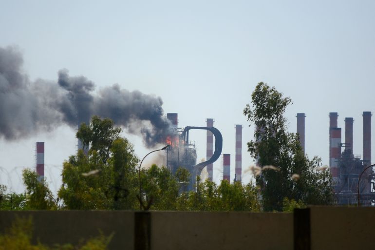 Smoke rises up in a unit of the Abadan oil refinery in southwestern Iran, July 19, 2025. Farid Hamoudi/Fars News/WANA (West Asia News Agency) via REUTERS ATTENTION EDITORS - THIS PICTURE WAS PROVIDED BY A THIRD PARTY