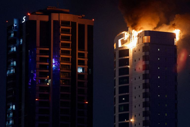 irrrrnr-1-1772305256 Smoke rises from a burning building hit by an Iranian drone strike, after Israel and the U.S. launched strikes on Iran, in Seef district, Manama, Bahrain, February 28, 2026. REUTERS/Hamad I Mohammed TPX IMAGES OF THE DAY