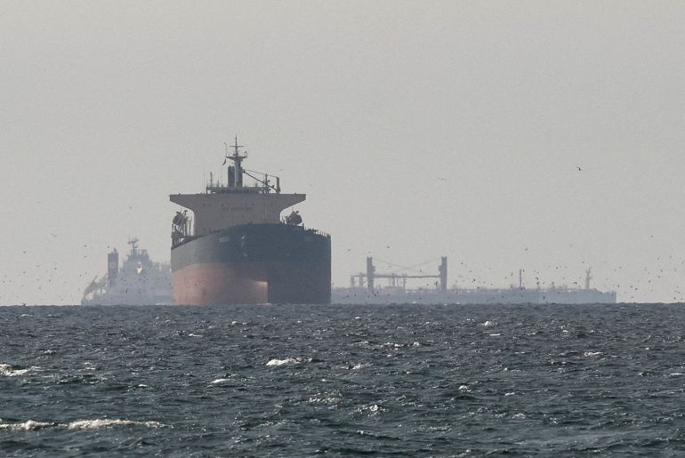 FILE PHOTO: Tankers sail in the Gulf, near the Strait of Hormuz, as seen from northern Ras al-Khaimah, near the border with Oman’s Musandam governance, amid the U.S.-Israeli conflict with Iran, in United Arab Emirates, March 11, 2026. REUTERS/Stringer/File Photo