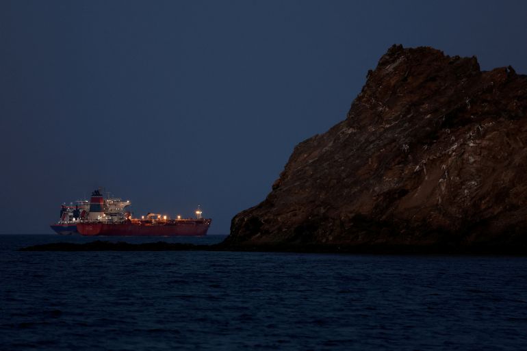 FILE PHOTO: The Callisto tanker sits anchored as the traffic is down in the Strait of Hormuz, amid the U.S.-Israeli conflict with Iran, in Muscat, Oman, March 10, 2026. REUTERS/Benoit Tessier/File Photo