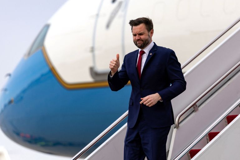 reuters_69b81d64-1773673828 U.S. Vice President JD Vance gives a thumbs up as he deplanes from Air Force Two at Joint Base Andrews, Maryland, U.S., March 13, 2026. Kent Nishimura/Pool via REUTERS