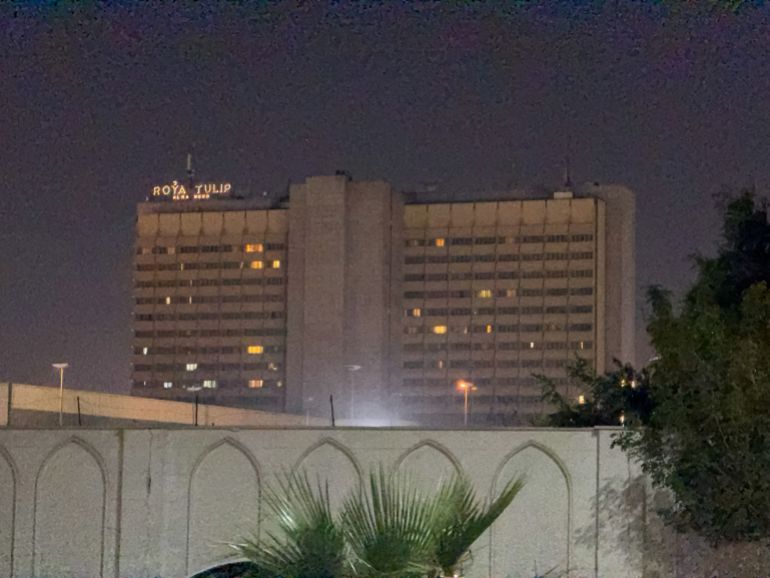 reuters_69b87a12-1773697554 The Al-Rasheed Hotel in Baghdad's Green Zone after a reported drone attack, according to security sources, in Baghdad, Iraq, March 16, 2026. REUTERS/Stringer