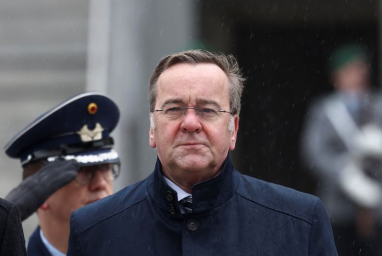 reuters_69b88422-1773700130 German Defence Minister Boris Pistorius looks on as he reviews a military honour guard with Latvia's Defence Minister Andris Spruds, in Berlin, Germany, March 16, 2026. REUTERS/Nadja Wohlleben