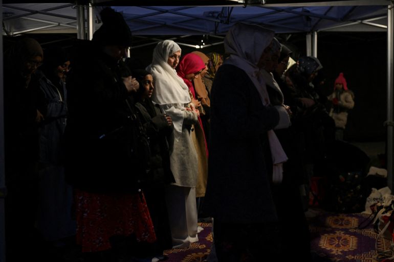 FILE PHOTO: Muslims pray during Open Iftar 2025 organised by the Ramadan Tent Project, at Trafalgar Square in London, Britain, March 29, 2025. REUTERS/Jaimi Joy/File Photo