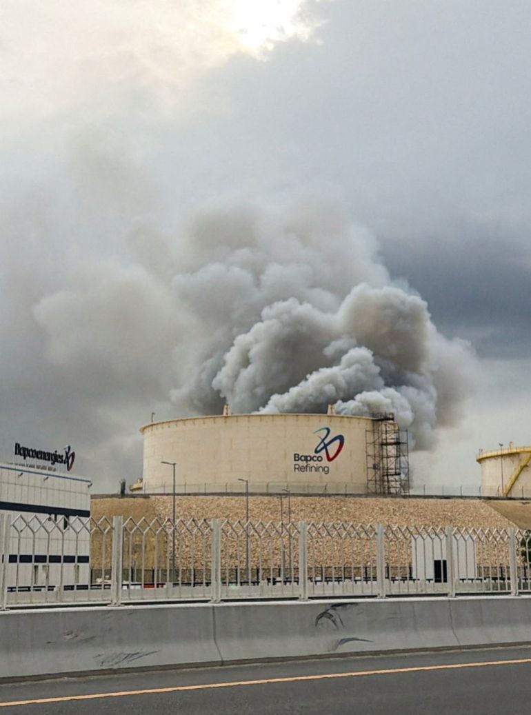 Smoke rises following a strike on the Bapco Oil Refinery, amid the U.S.-Israeli conflict with Iran, on Sitra Island Bahrain, March 9, 2026. Picture taken with a mobile phone. REUTERS/Stringer REFILE - UPDATING LOCATION IN HEADLINE