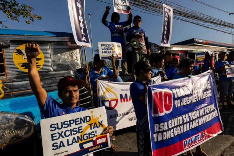 Jeepney drivers stage a rally during their 2-day strike to protest over rising fuel prices amid the U.S.-Israeli conflict with Iran, in Quezon City, Philippines, March 26, 2026. REUTERS/Eloisa Lopez