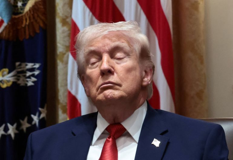 U.S. President Donald Trump attends a cabinet meeting at the White House in Washington, D.C., U.S., March 26, 2026. REUTERS/Evelyn Hockstein