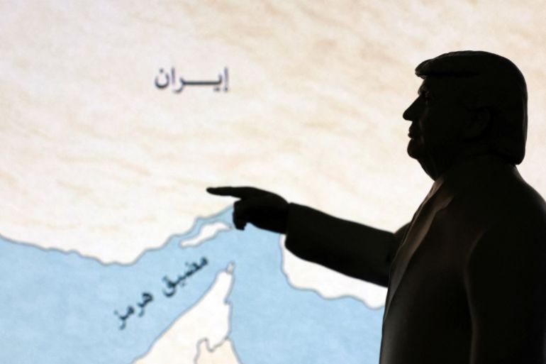 reuters_69c7f00a-1774710794 A 3D-printed miniature model depicting U.S. President Donald Trump and map showing the Strait of Hormuz, also known as Madiq Hurmuz, are seen in this illustration taken March 26, 2026. REUTERS/Dado Ruvic/Illustration