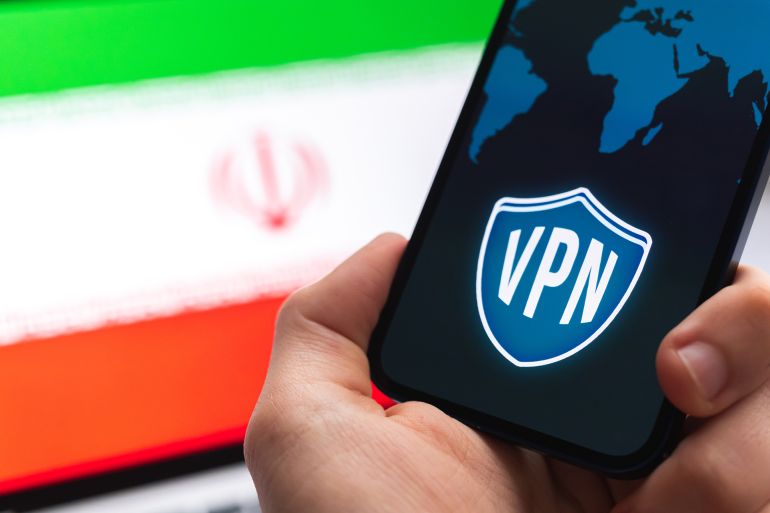 shutterstock_2152660473-1764604518 VPN in Iran. Secure and safe internet concept. Privacy. Hand with mobile phone and VPN application. Flag and laptop on the background photo; Shutterstock ID 2152660473; purchase_order: aj; job: ; client: ; other: