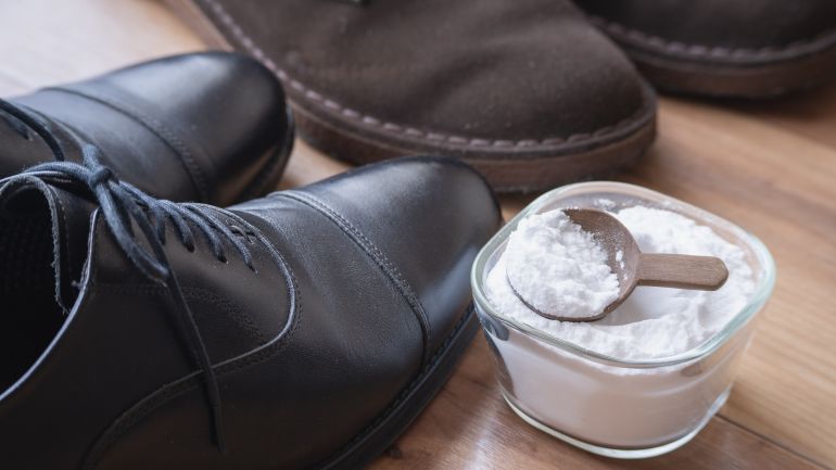 shoes and baking soda. Deodorizing image of shoes.