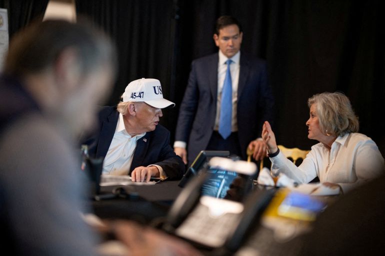 FILE PHOTO: U.S. President Donald Trump speaks with White House Chief of Staff Susie Wiles and Secretary of State Marco Rubio during military operations in Iran, at Trump's Mar-a-Lago resort in Palm Beach, Florida, U.S. February 28, 2026. The White House/Social Media/Handout via REUTERS. THIS IMAGE HAS BEEN SUPPLIED BY A THIRD PARTY. SOME AREAS BLURRED AT SOURCE./File Photo