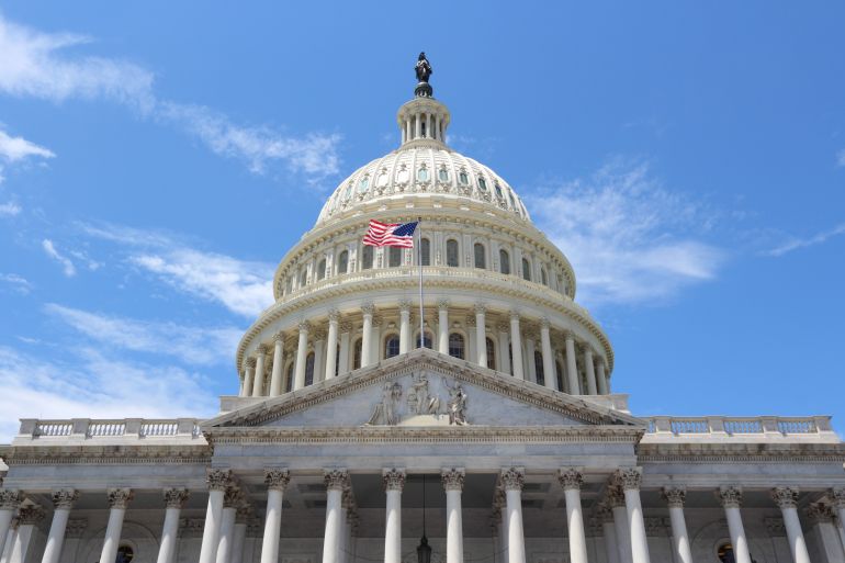 Washington DC, United States landmark. National Capitol building with US flag.