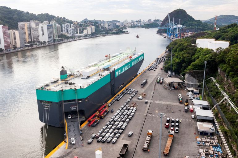 FILE PHOTO: A drone view shows Chinese GWM vehicles disembarking Vessel Porgy from Wallenius Wilhelmsen, at the port of Vitoria, in the state of Espiritu Santo, Brazil April 16, 2025. REUTERS/Gabriel Lordello/File Photo