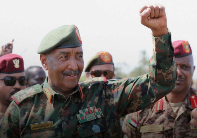 5d5f454d3-1743077057 Sudan's army chief Abdel Fattah al-Burhan gestures to soldiers inside the presidential palace after the Sudanese army said it had taken control of the building, in the capital Khartoum, Sudan March 26, 2025. Sudan Transitional Sovereignty Council/Handout via REUTERS THIS IMAGE HAS BEEN SUPPLIED BY A THIRD PARTY TPX IMAGES OF THE DAY