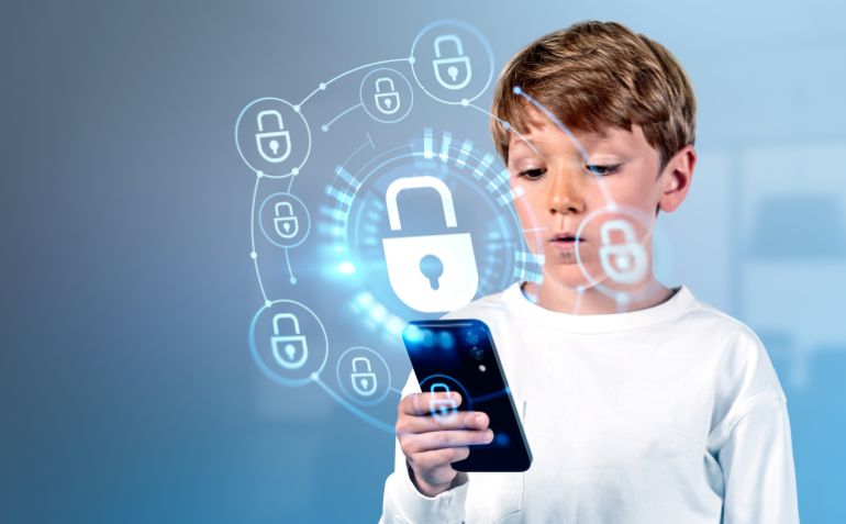 6545641653-1775815042 Child school boy with smartphone, digital cybersecurity hologram with glowing lock circuit. Cybersecurity hud and connection. Concept of data protection