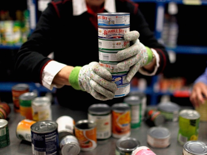 GAITHERSBURG, MD - NOVEMBER 07: Manna Food Center volunteers sort sort donated canned foods at the center November 7, 2011 in Gaithersburg, Maryland. As the economic recession has draged on in the United States and around the world, since 2008 Manna has seen a more-than two-fold increase in the amount of food it annually distributes. Due to federal budget cuts this year Manna has not received turkeys or other protein items to distribute to needy families for the holiday season. New U.S. Census data show that a record number of Americans are now counted among the ranks of the 'poorest poor,' or those who live on less than $5,570 annually for an individual or $11,157 for a family of four.