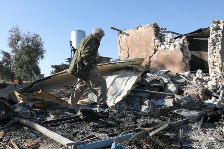 An Iranian Kurdish Peshmerga member of the Kurdistan Democratic Party of Iran (KDPI) inspects the damage sustained at the Azadi Camp of the Kurdistan Democratic Party of Iran (KDPI) following an Iranian cross-border attack in the town of Koye (Koysinjaq), in the east of Erbil district in the autonomous Kurdish region of northern Iraq on March 3, 2026.