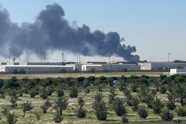 TOPSHOT - Smoke rises from an area of Kuwait's international airport after a reported drone strike on April 1, 2026.
